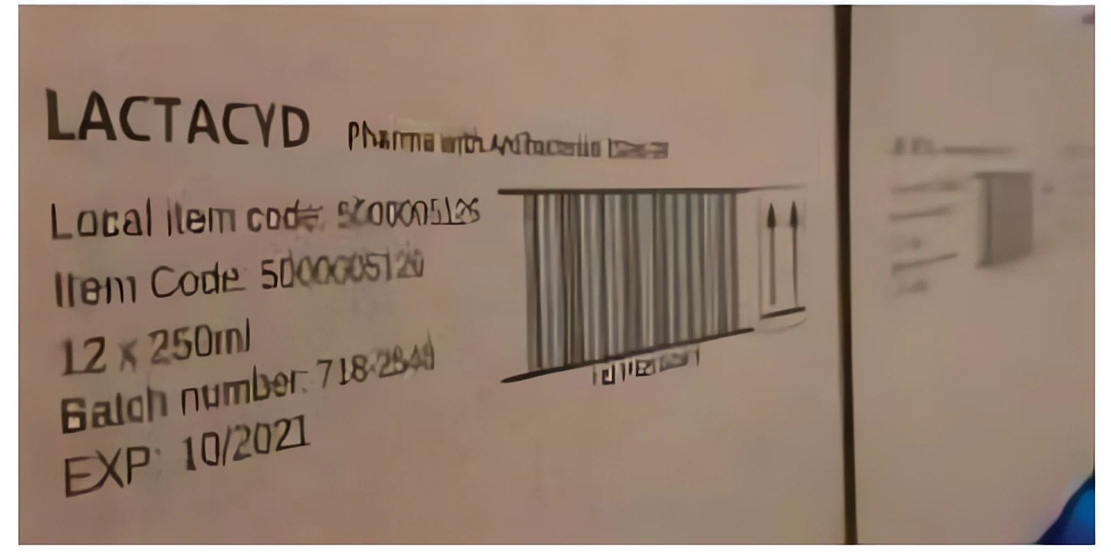 Batch code and barcode printed on a carton